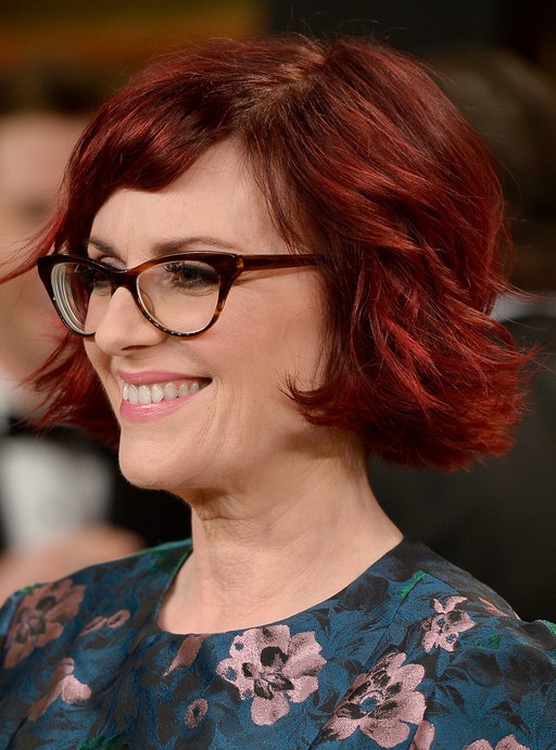 Side View of Megan Mullally Layered Red Razor Cut | Styles Weekly