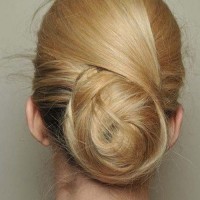 Back View of Low Swirling Highlighted Chignon Updo