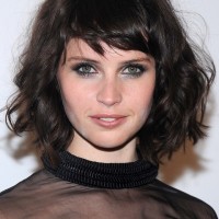 Felicity Jones Short Messy Dark Curly Hairstyle