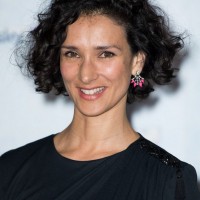 Indira Varma Short Black Curly Hairstyle