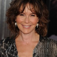 Jennifer Grey Medium Messy Hairstyle with Bangs for Women Over 50