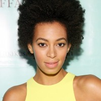 Solange Knowles Cool Trendy Short Curly Haircut for Black Women