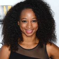 African American Medium Naturally Curly Hairstyle from Monique Coleman