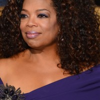 African American Naturally Curly Hairstyle for Medium Hair from Oprah Winfrey