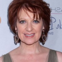 Caroline Manzo Short Red Wavy Haircut for Women Over 50