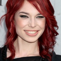Chloe Dykstra Medium Red Wavy Hairstyle with Bangs
