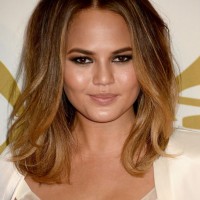 Chrissy Teigen Medium Ombre Wavy Hairstyle for Round Faces