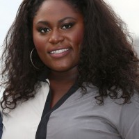 Danielle Brooks Medium Black Curly Hairstyle for Black Women