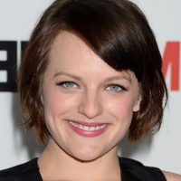 Elisabeth Moss Chic Short Haircut with Side Swept Bangs for Summer