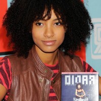 Esperanza Spalding Naturally Curly Hairstyle for Medium Length Hair