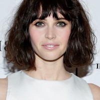 Felicity Jones Short Wavy Haircut with Choppy Bangs