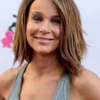 Jennifer Grey Sassy Medium Straight Haircut with Layers