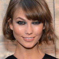 Karlie Kloss Cute Short Wavy Hairstyle with Bangs