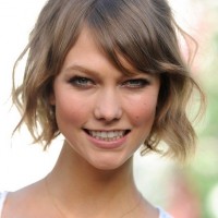 Karlie Kloss Fun Short Wavy Bob Haircut with Bangs