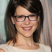 Lisa Loeb Chic Layered Brown Straight Haircut with Side Swept Bangs