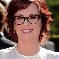 Megan Mullally Short Layered Red Razor Haircut for Fall