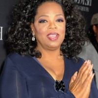 Oprah Winfrey Shoulder Length Black Curly Hairstyle for Women Over 50