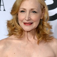 Patricia Clarkson Medium Blonde Curly Hairstyle for Women Over 50