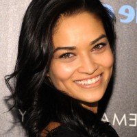 Shanina Shaik Medium Black Wavy Curly Hairstyle for Women