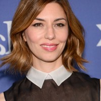 Sofia Coppola Short Red Wavy Hairstyle for Fall