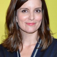 Tina Fey Latest Medium Brown Wavy Hairstyle for Oval Faces