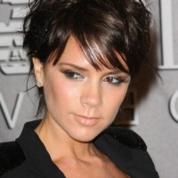 Victoria Beckham Short Wavy Hairstyle with Bangs for Fall