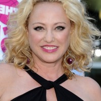 Virginia Madsen Blonde Wavy Curly Hairstyle for Oval Faces