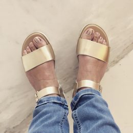 Notoriously Noticeable Sandal. These metallic gold sandals have a history of turning heads! # 