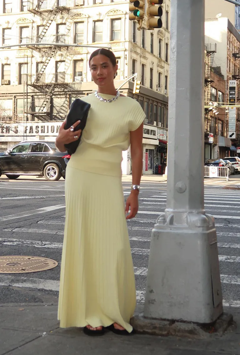 Silver Necklace Yellow Knit Top Matching Maxi Skirt Black Flip Flops Black Clutch Bag